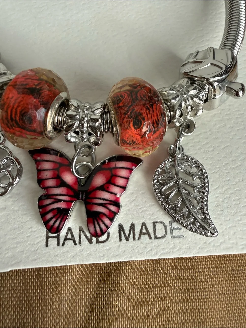 Mint Silver-Tone Charm Bracelet with Red-Pink Butterfly and Orange Beads